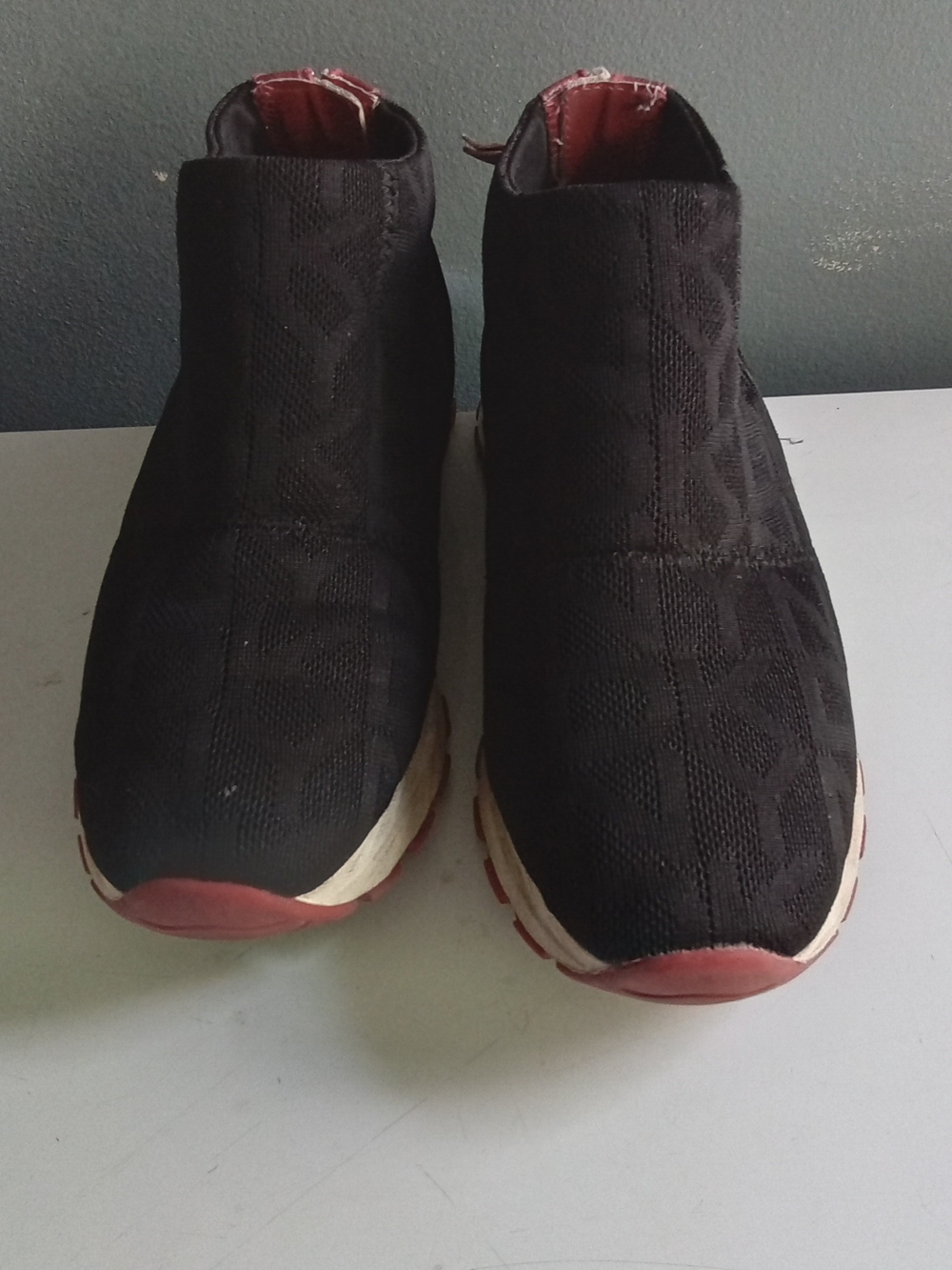 DKNY 1989 Black Monogram Knit High Top Slip On Sneakers Back Zip Red Accent